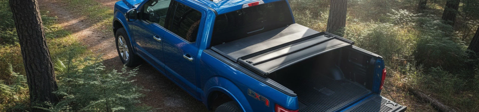 Zacht vinyl in drieën gevouwen tonneau-cover
